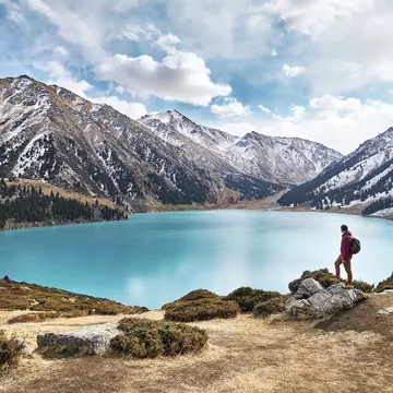 Scenic view of a man looking over Almaty.