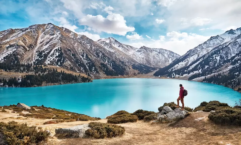 Scenic view of a man looking over Almaty.