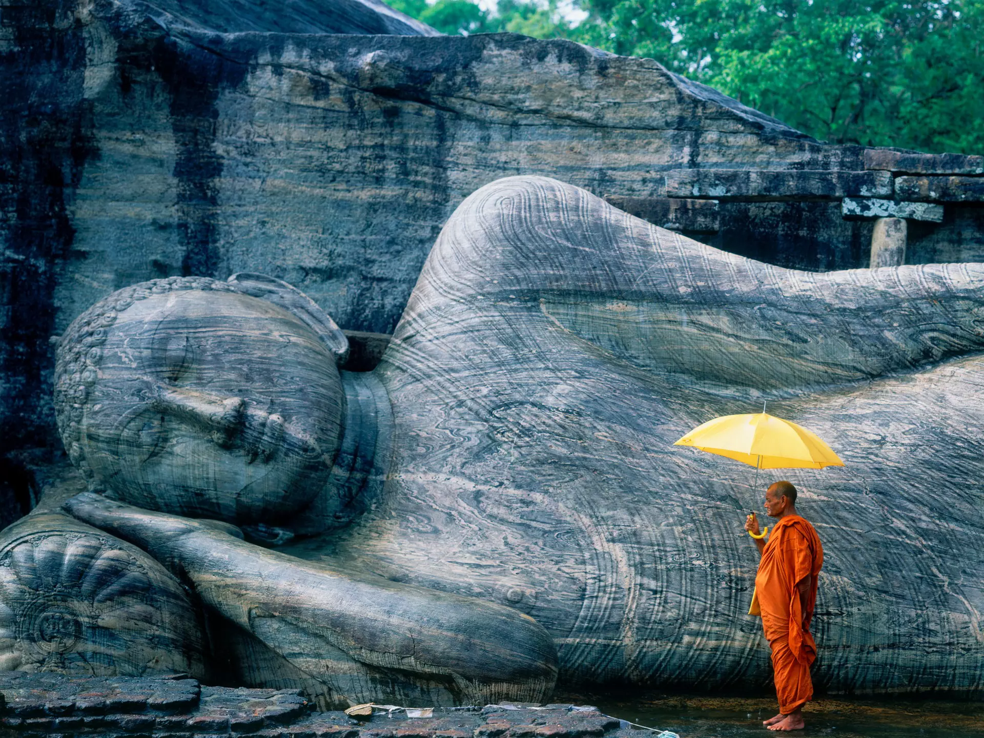 Buddhist monk at the Gal Vihara in Sri Lanka. Hugh Sitton/Getty Images