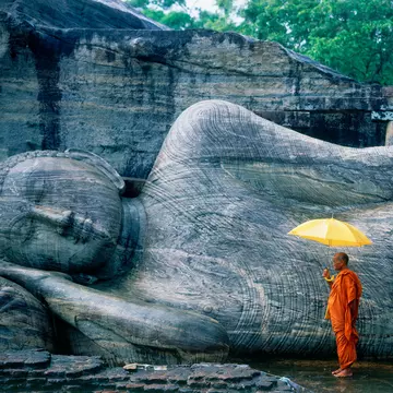 Buddhist monk at the Gal Vihara in Sri Lanka. Hugh Sitton/Getty Images