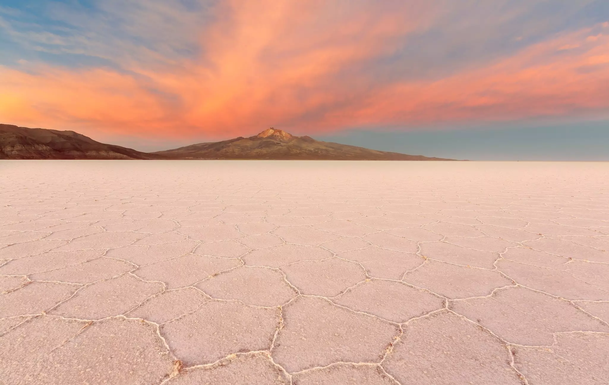 Salt desert Uyuni at sunset, Bolivia. Manamana/Shutterstock