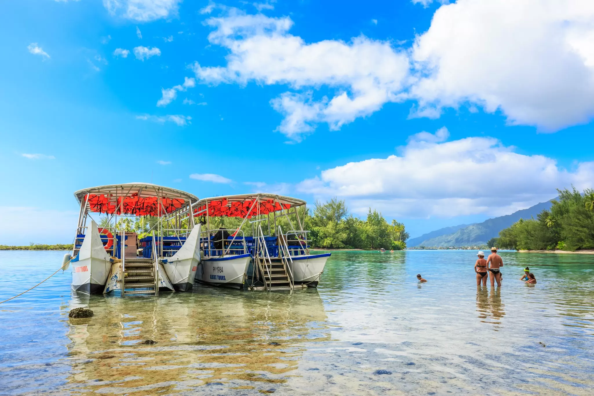 A dip in crystal clear water is just the tonic for jetlag. sarayuth3390 / Getty Images