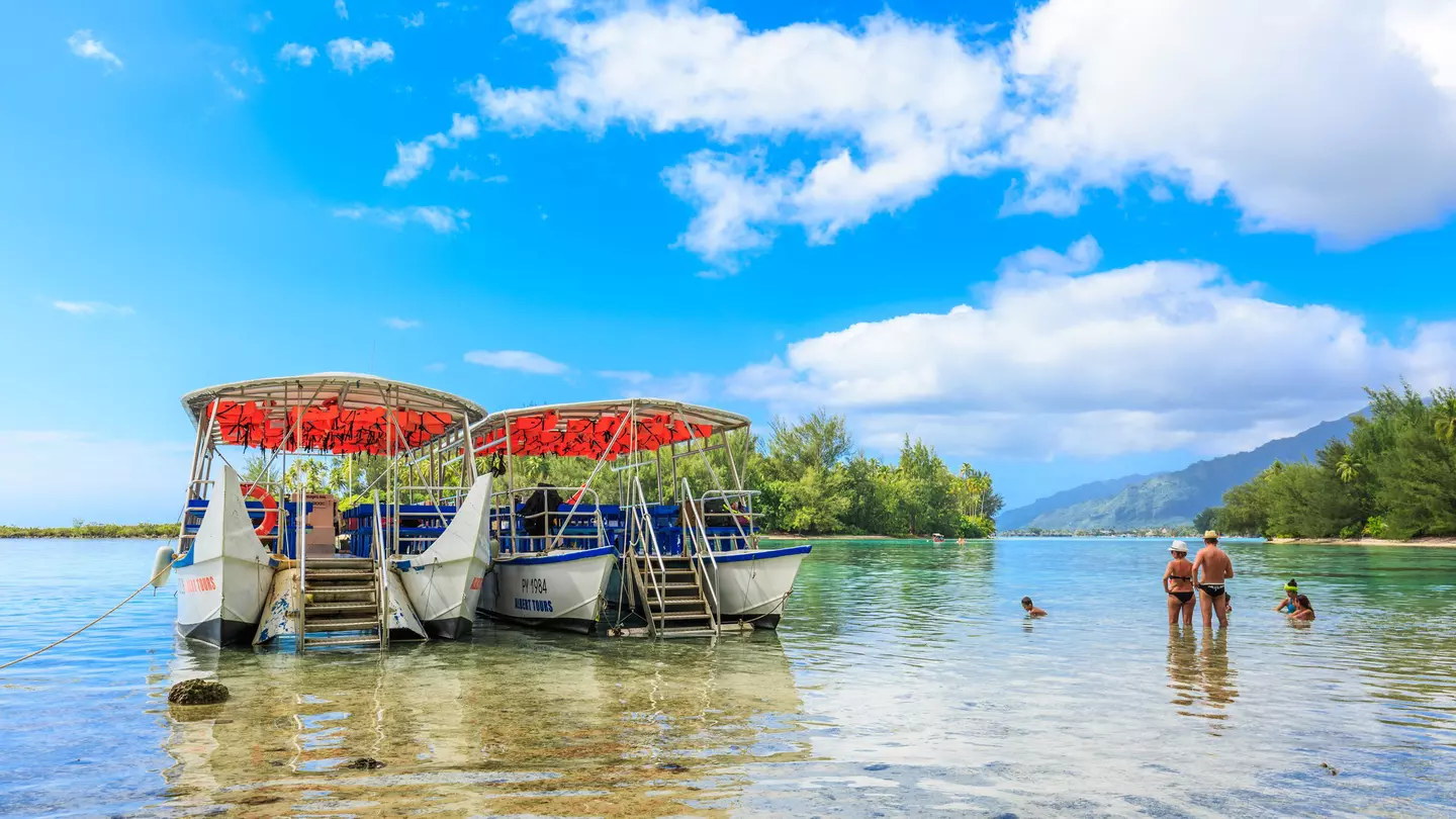 A dip in crystal clear water is just the tonic for jetlag. sarayuth3390 / Getty Images