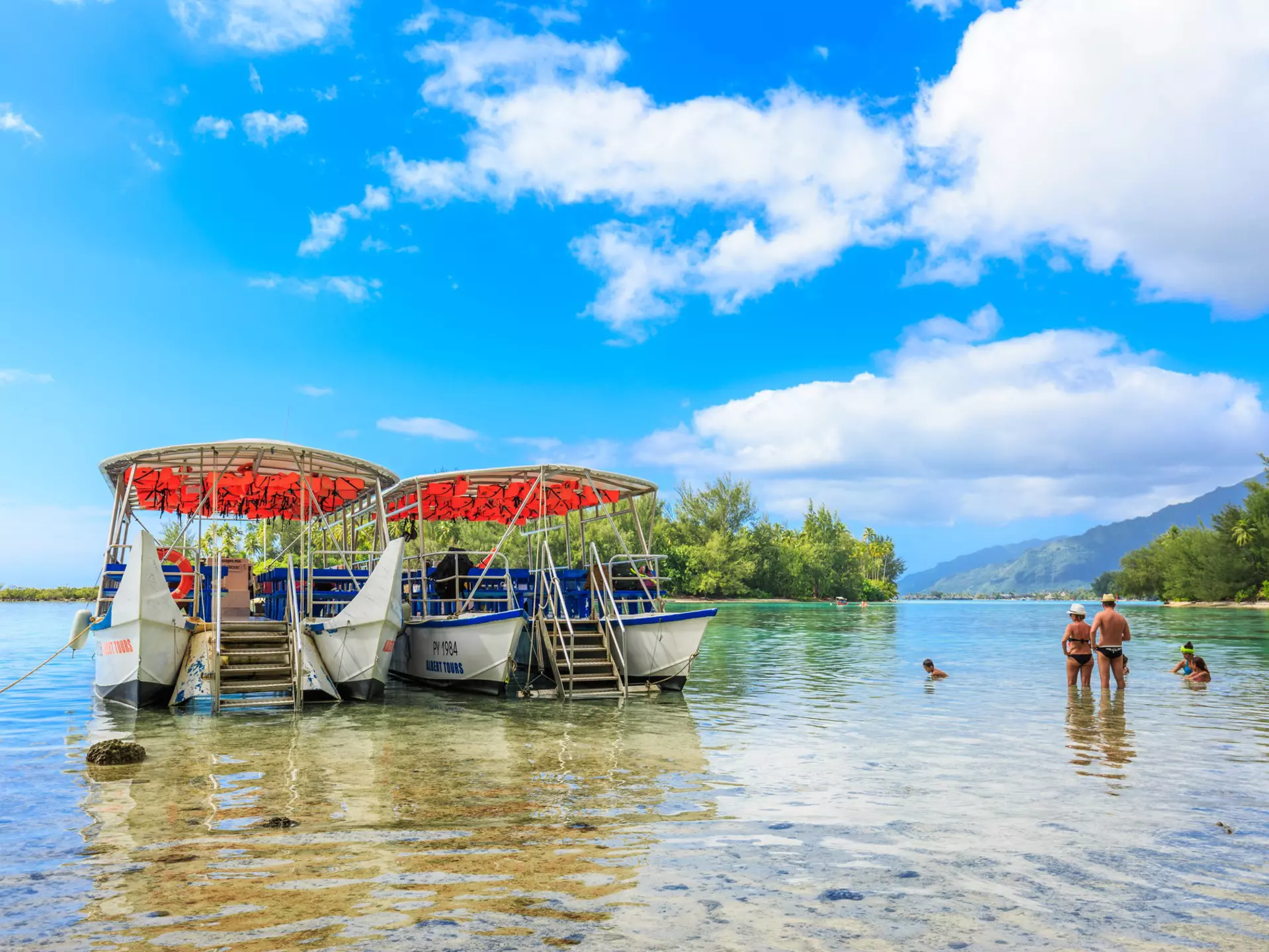 A dip in crystal clear water is just the tonic for jetlag. sarayuth3390 / Getty Images
