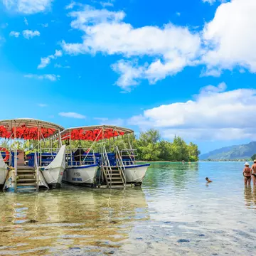 A dip in crystal clear water is just the tonic for jetlag. sarayuth3390 / Getty Images
