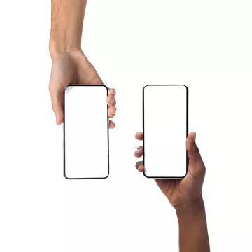 Closeup of female and male hands holding 2 smartphones with white empty screen, showing using devices, transfer data, sharing media. Two vertical gadgets with copy space, mock up, studio background; Shutterstock ID 2086636222; purchase_order:56530 - Guidebooks; job:Global Publishing-WIP; client:Budapest & Hungary 10.; other:Ania Lenihan
2086636222