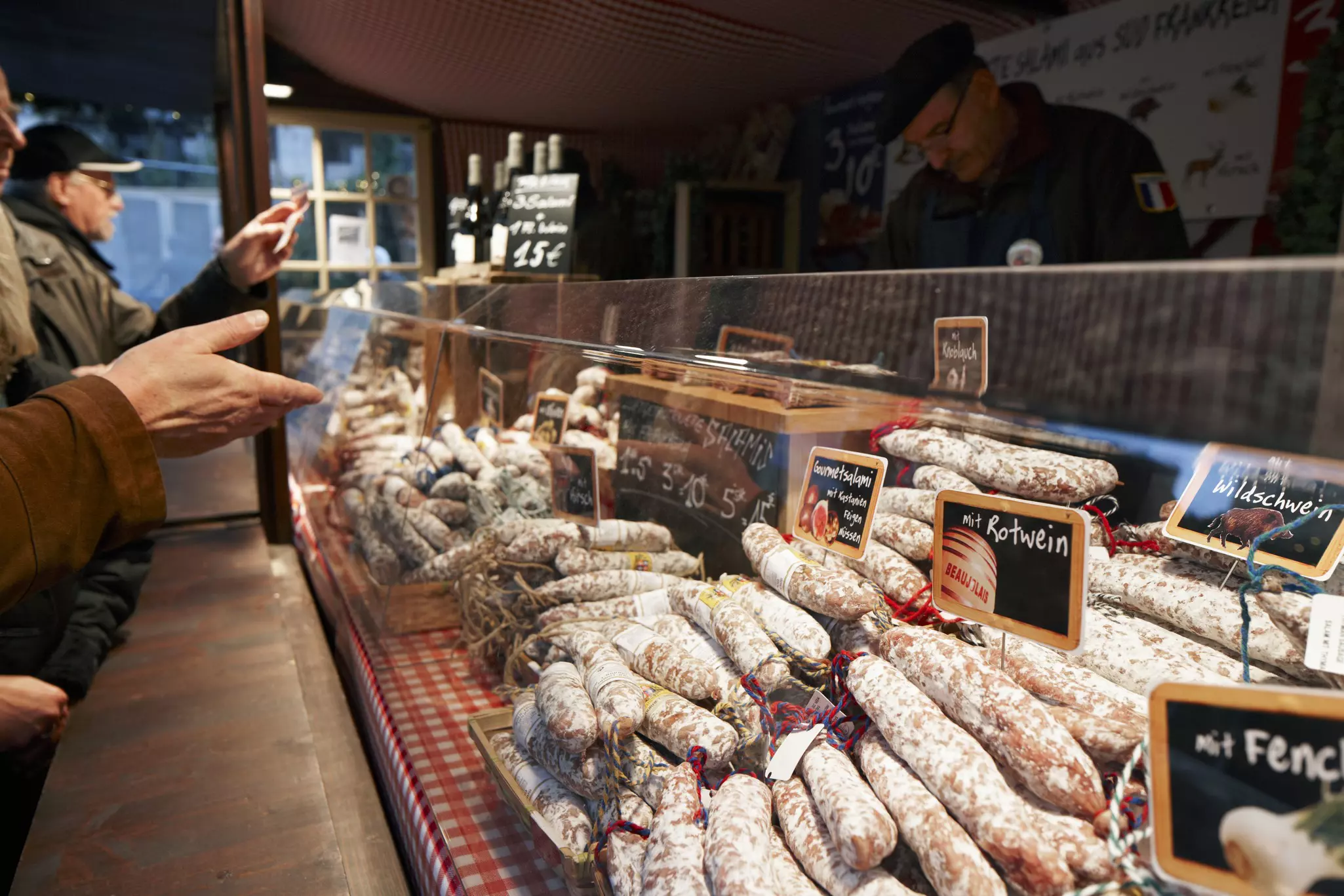 Cologne Christmas Market stall serving traditional sausage