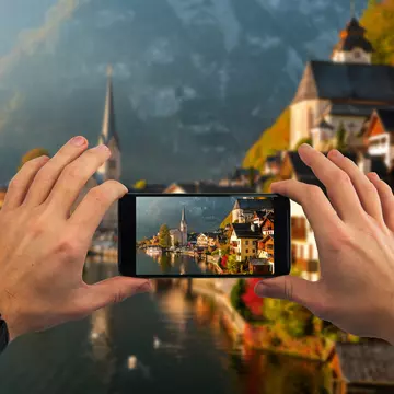 The Austrian town of Hallstatt has become wildly popular with tourists – to locals’ dismay © 	Anton Petrus / Getty Images
