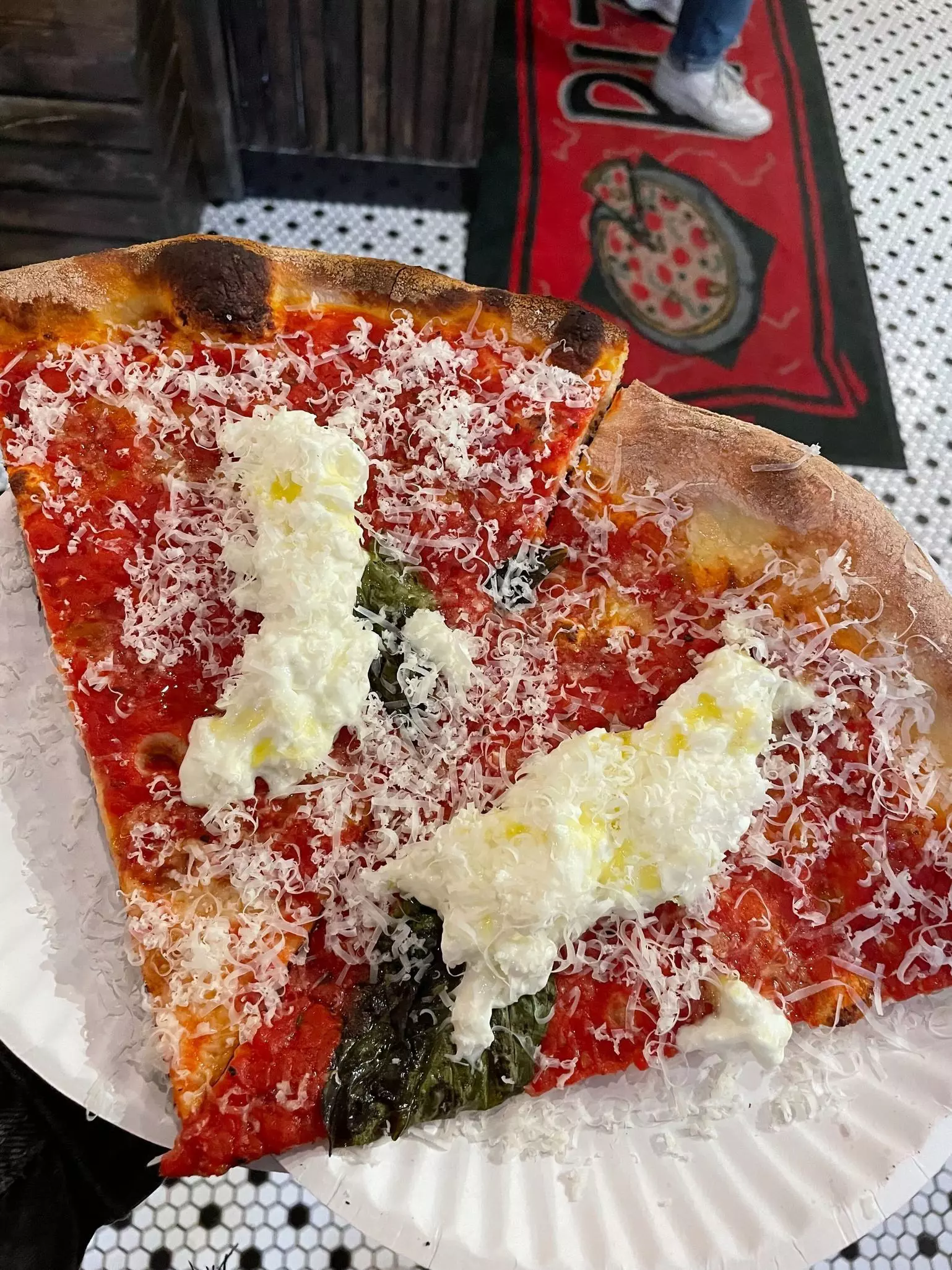 A slice of burrata pizza from Cello's Pizzeria in NYC's East Village
Photo by Alice Yao