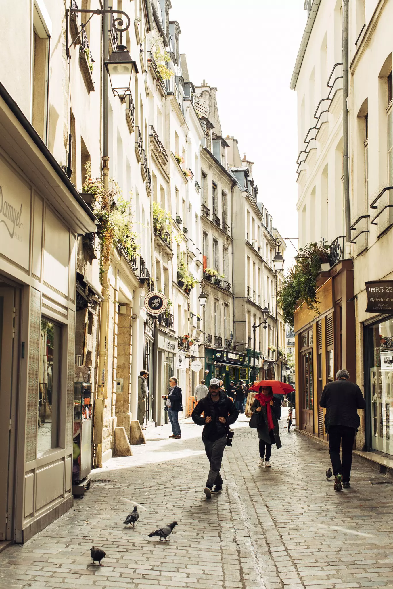 Street scene on the Rue des Rosiers, which means "street of the rosebushes," Paris, France.