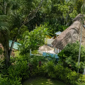 A thatched cabin at the Lodge at Chaa Creek, San Ignacio, Belize.