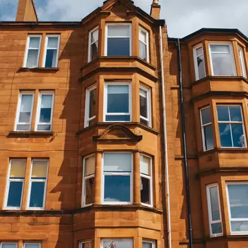 Tenement building the historic suburb of Dennistoun, in the East End of Glasgow, License Type: media, Download Time: 2025-08-06T19:35:26.000Z, User: katelyn.perry_lonelyplanet, Editorial: false, purchase_order: 65050 - Digital Destinations and Articles, job: wip, client: wip, other: Katelyn Perry