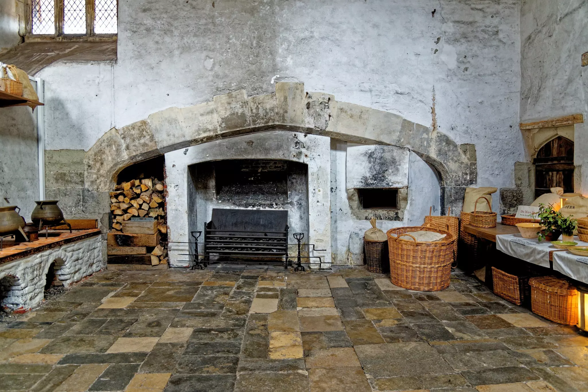 King Henry VIII's royal kitchen at Hampton Court Palace, London, England.