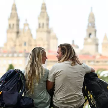 Liz Hooper and Joe Sills in Santiago de Compostela after completing the Camino de Santiago. © Joe Sills/Lonely Planet