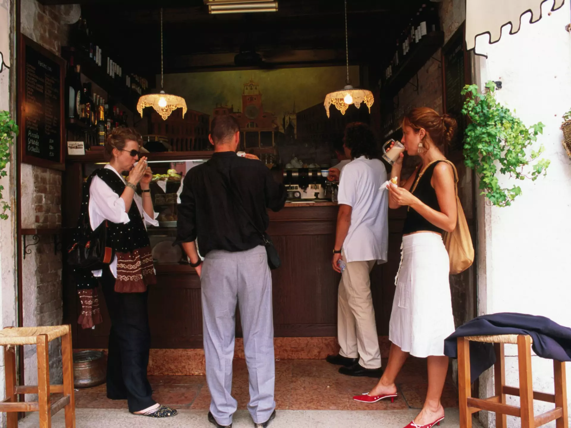 Locals take a standing coffee at Al Marca cafe.
18878-51
Europe, Italy, Veneto, Venice, bar, beverage, cafe, coffee, drink, eating out, food & drink, people, stand