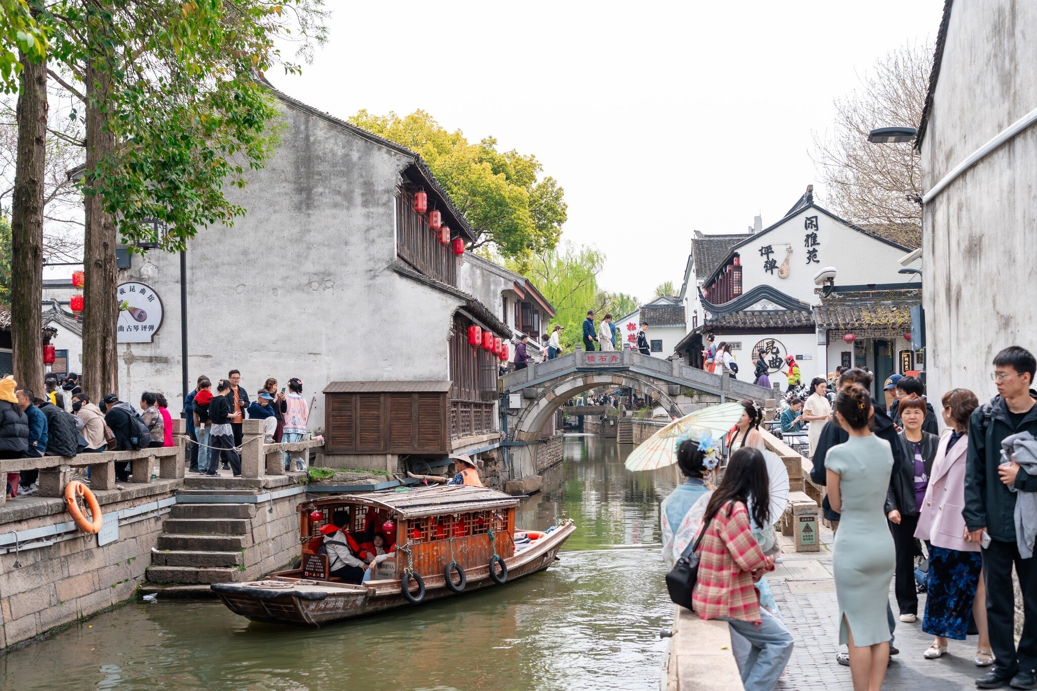 Suzhou, China - Apr 04, 2025; Crowds of tourists enjoying at Pingjiang road in Suzhou, China, License Type: media, Download Time: 2026-09-01T19:13:49.000Z, User: LP_NZhan, Editorial: true, purchase_order: 65050 - Digital Destinations and Articles, job: App Content, client: Lonely Planet App, other: Nadine Zhan