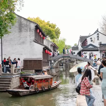 Suzhou, China - Apr 04, 2025; Crowds of tourists enjoying at Pingjiang road in Suzhou, China, License Type: media, Download Time: 2026-09-01T19:13:49.000Z, User: LP_NZhan, Editorial: true, purchase_order: 65050 - Digital Destinations and Articles, job: App Content, client: Lonely Planet App, other: Nadine Zhan