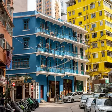 Hong Kong, China - May 10 2020: Blue House is a 4-storey balcony-type tenement block located at 72-74A Stone Nullah Lane, Wan Chai, Hong Kong., License Type: media, Download Time: 2024-08-29T09:28:07.000Z, User: pinkjozie64, Editorial: true, purchase_order: 56530, job: Global Publishing WIP, client: Pocket_Hong Kong 9, other: Jo-anne Riddell