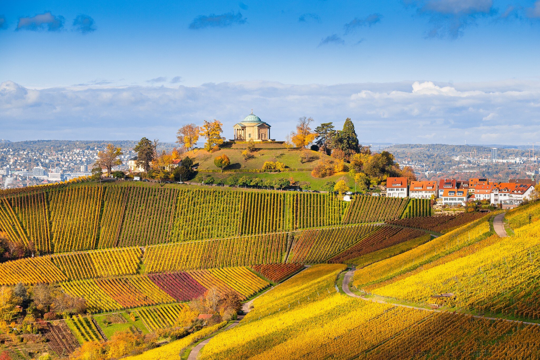 Wide view of Grabkapelle Württemberg Rotenberg and surrounding vineyards in Stuttgart, Germany.