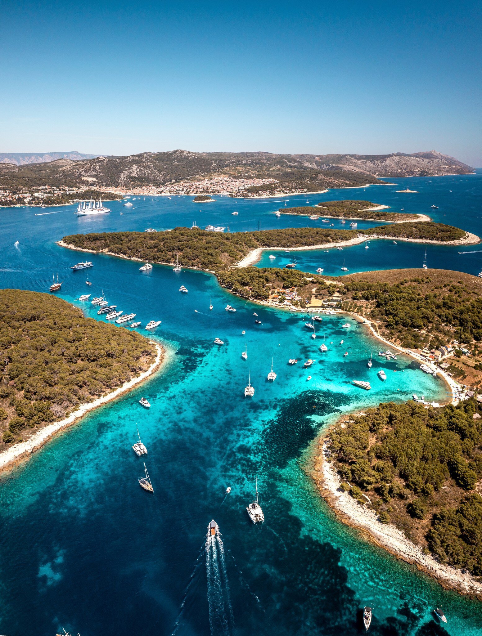 Aerial view of Paklinski islands and Hvar old town during summer, Dalmatia, Croatia.