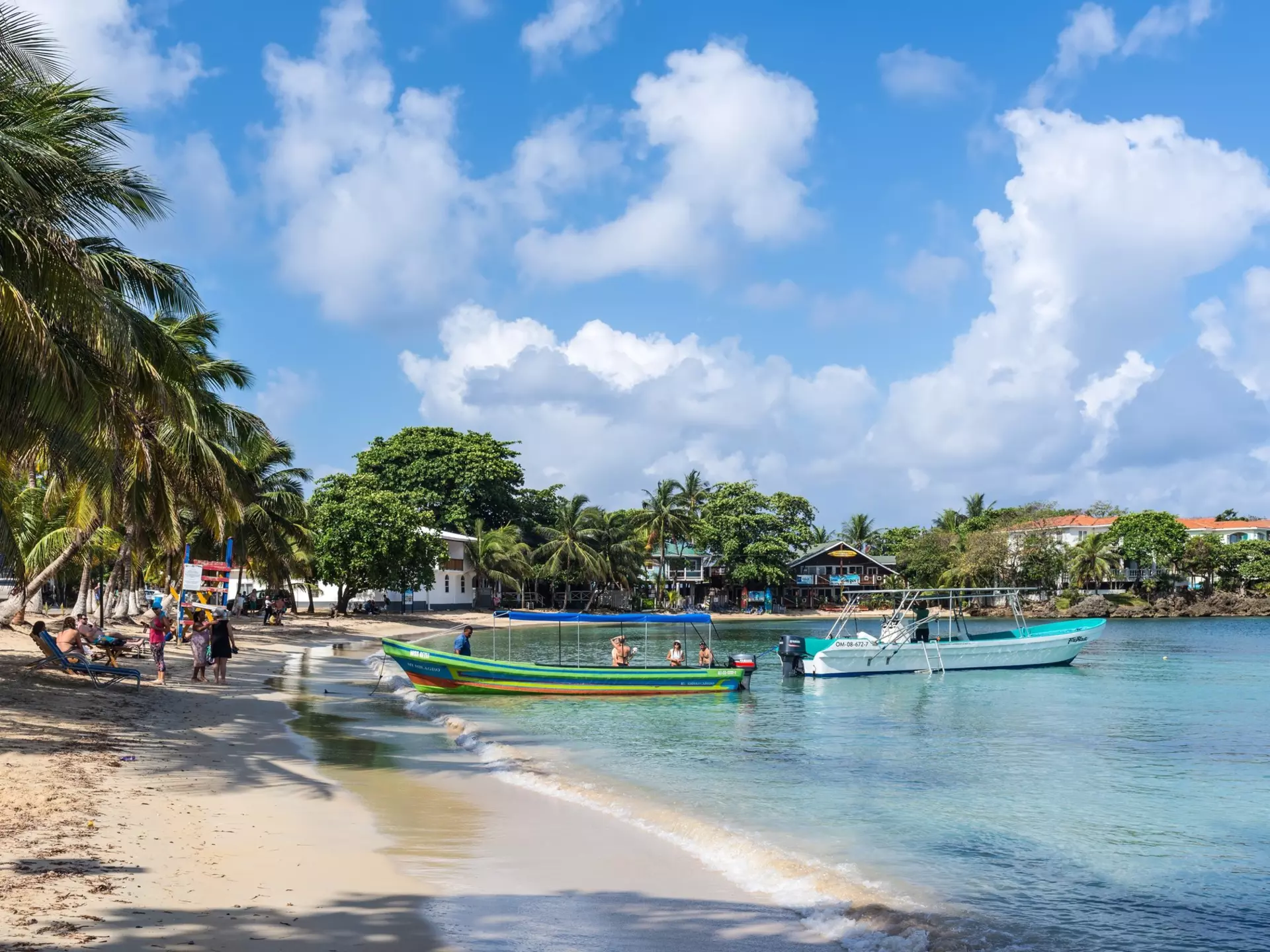 Isla de Roatan, Honduras - April 16, 2024: Half Moon Bay beach with a dock and boats on Roatan Island, Honduras., License Type: media, Download Time: 2026-06-06T21:03:45.000Z, User: Malecia.Elamin_Lonelyplanet, Editorial: true, purchase_order: 65050 - Digital Destinations and Articles, job: Online Editorial, client: Best beaches in Honduras, other: Malecia Walker