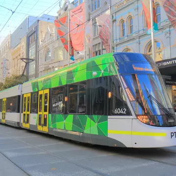 Explore Melbourne's vibrant culture, foodie enclaves, and historic landmarks aboard its iconic tram system. TK Kurikawa/Shutterstock