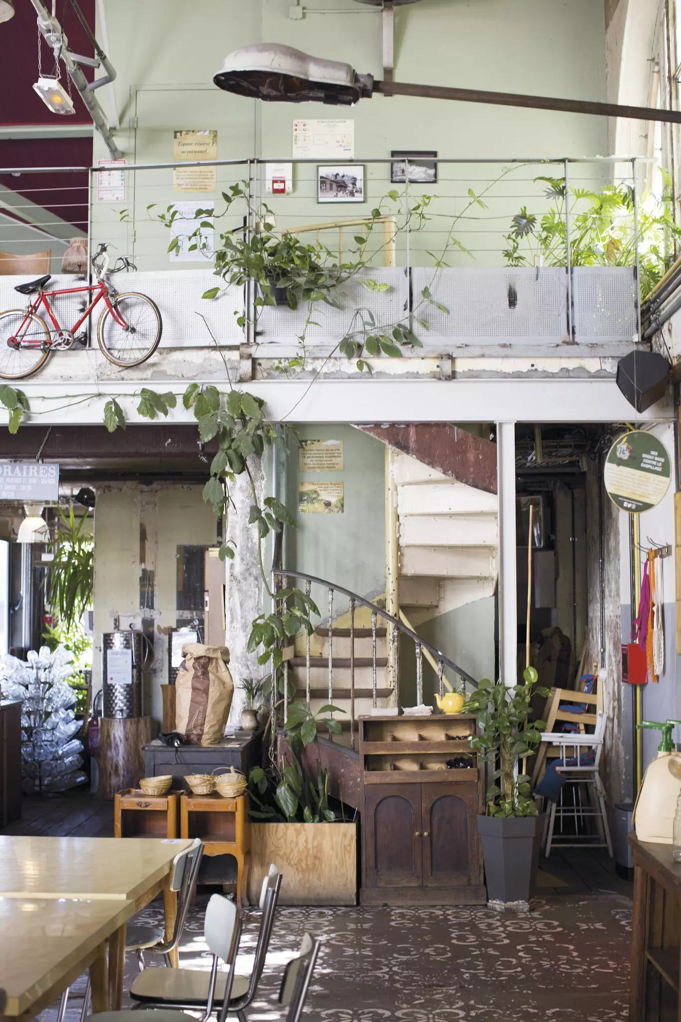 Interior of LA Recyclerie eco-conscious collective venture in former station Gare Ormano, 18th arrondissement.