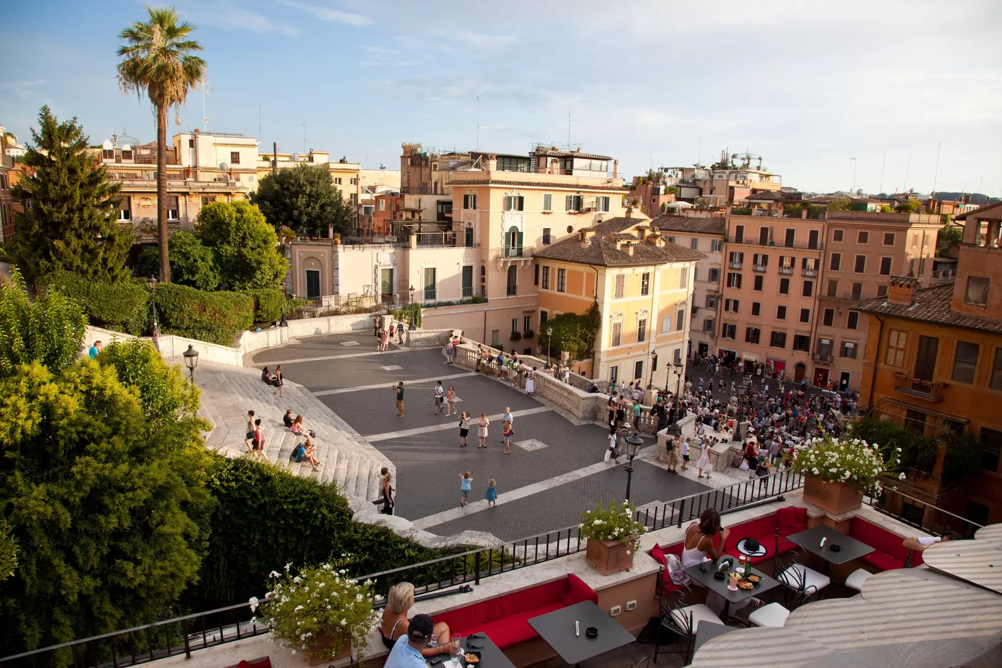 High-angle view of a crowd gathered on the Spanish Steps in Rome, Italy.