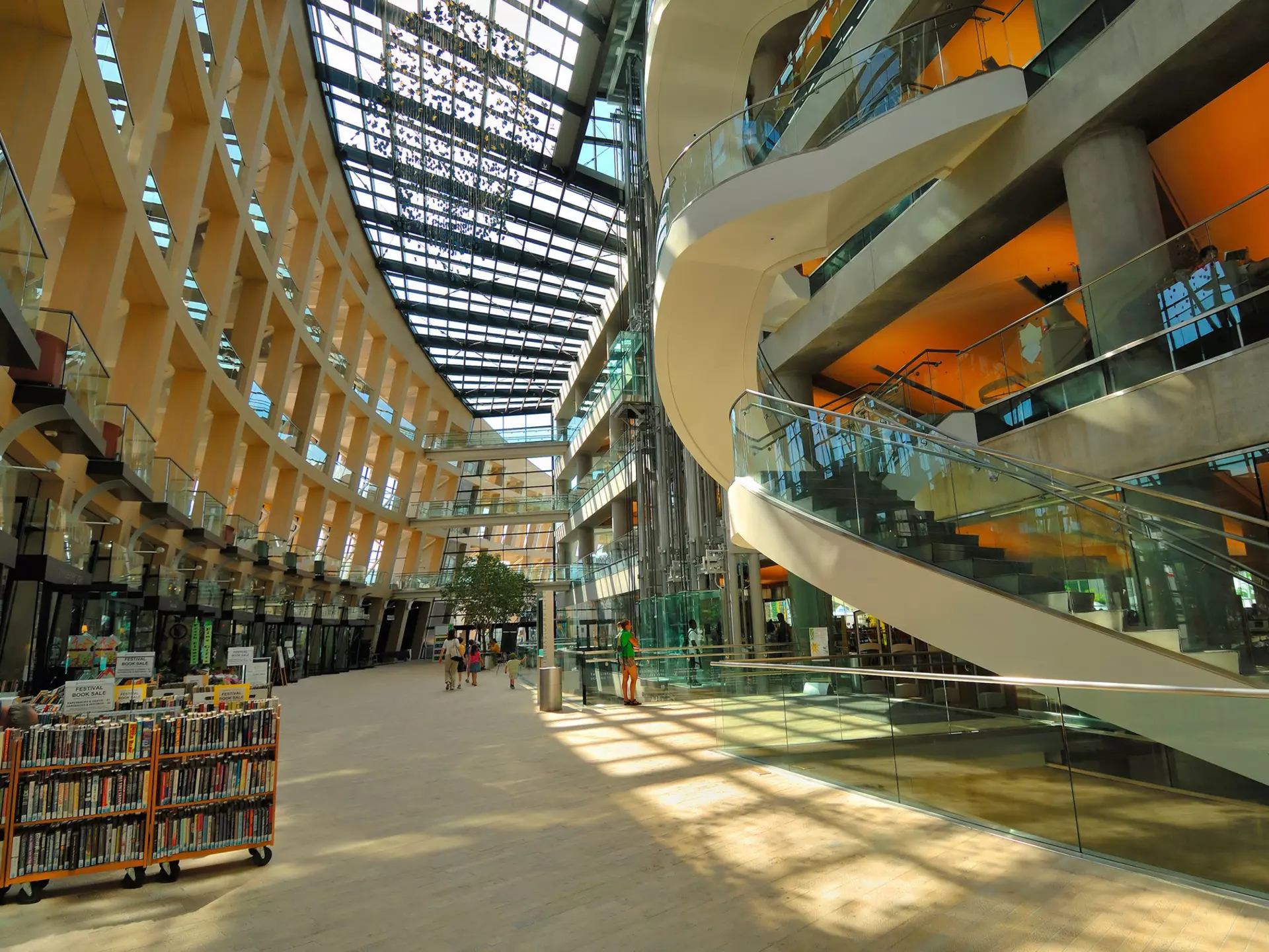 The modern atrium with stairwells, hallways and racks of books at Salt Lake City Public Library