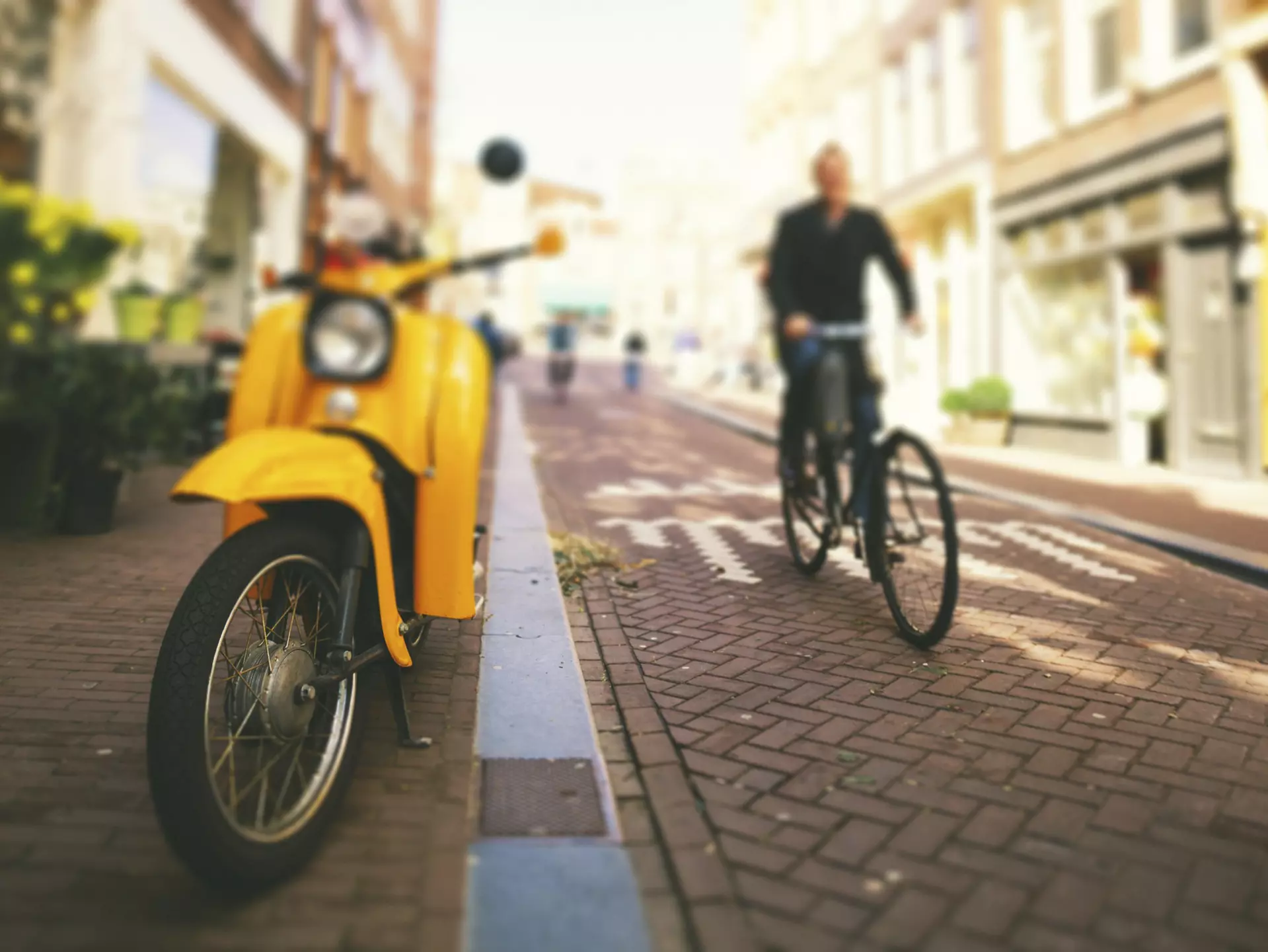 Street scene from Amsterdam downtown. Yellow scooter. Tilt shift lens.
Adult; Adults Only; Alley; Amsterdam; Bicycle; Capital Cities; City; City Life; City Street; Cityscape; Cycle; Cycling; Day; Diminishing Perspective; Europe; Focus; Healthy Lifestyle; Horizontal; Image Focus Technique; Lifestyles; Male; Males; Men; Motor Scooter; Narrow; Netherlands; One Man Only; One Person; Only Men; Outdoors; People; Personal Perspective; Photography; Road; Selective Focus; Shopping Mall; Sidewalk; Single Object; Street; Sun; Sunlight; Sunny; Tilt-Shift; Travel; Unrecognizable Person; Urban Road; Vanishing Point; Wheel; Yellow;
