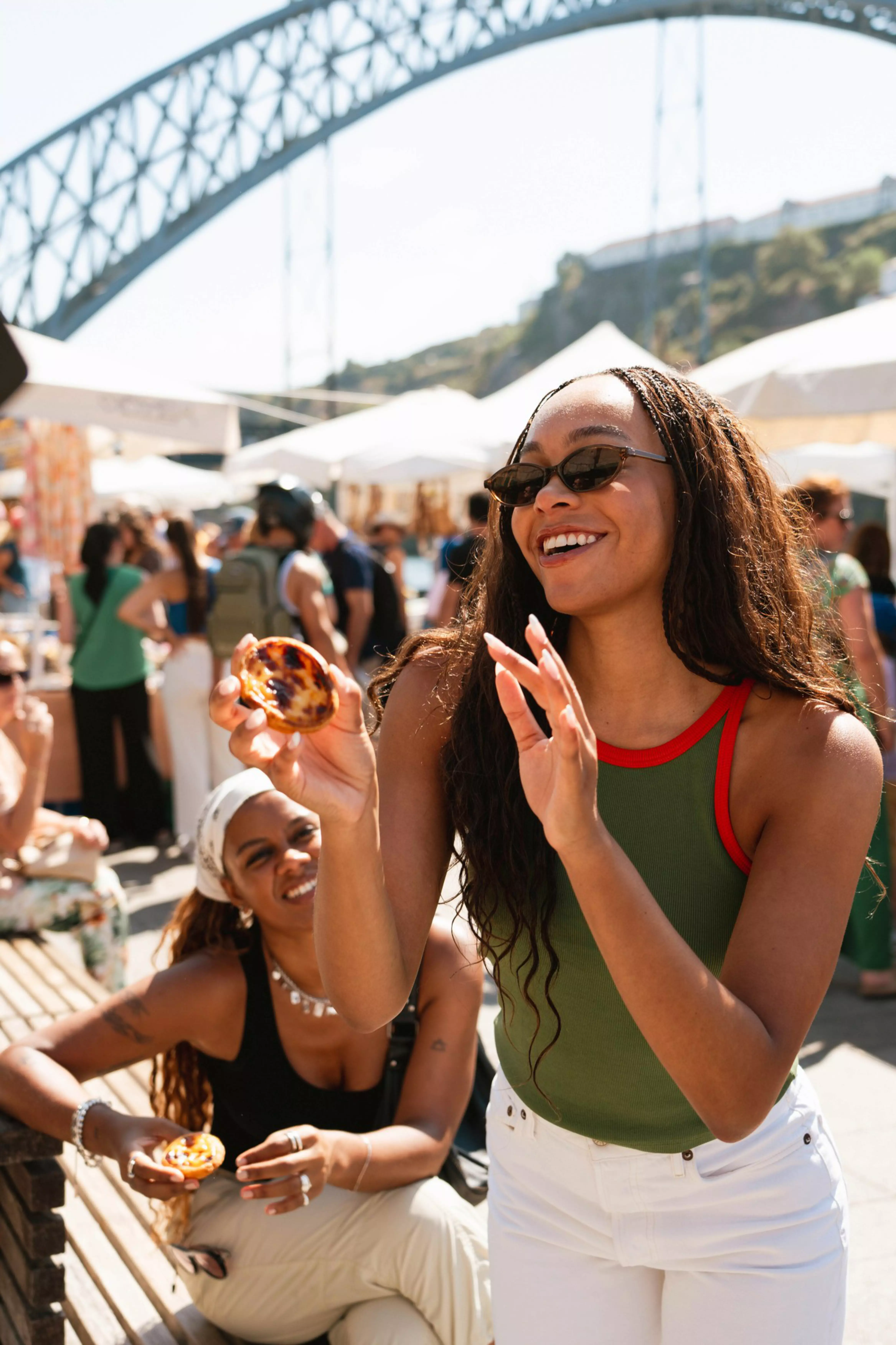 Hunter and Peyton with pasteis de nata, a classic Portuguese custard tart.