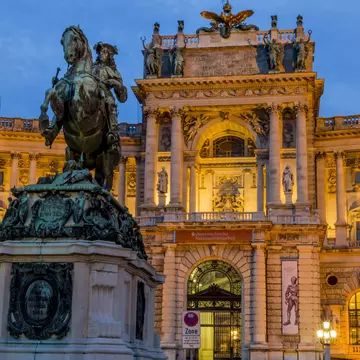 Austria, Vienna, view to lighted Hofburg Palace at twilight