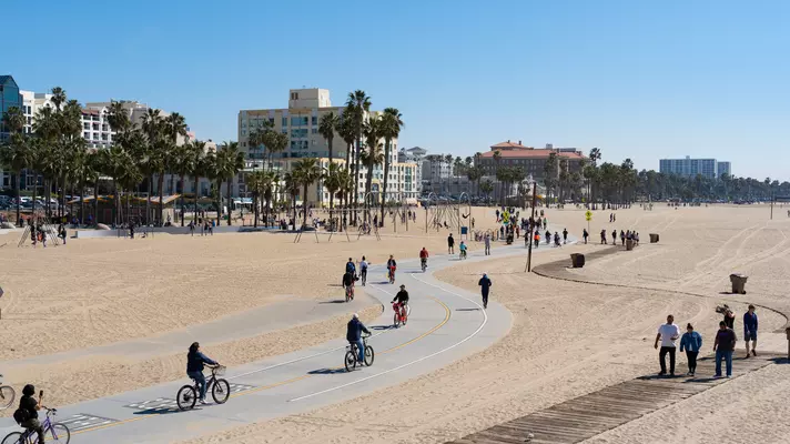 Cyclists on the Venice Beach Boardwalk
