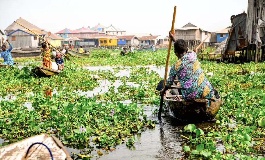 Africa, West Africa, Benin, Lake Nokoue, Ganvié. Pirogues in the water streets of the lakeside town of Ganvié.
1246920424