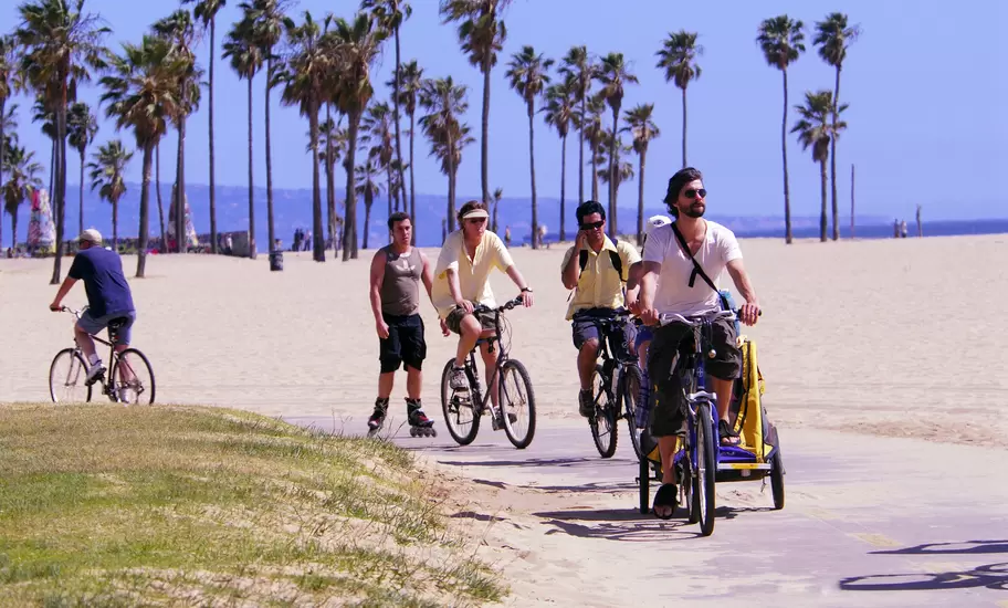 Cyclists and in-line skaters at Venice Beach.