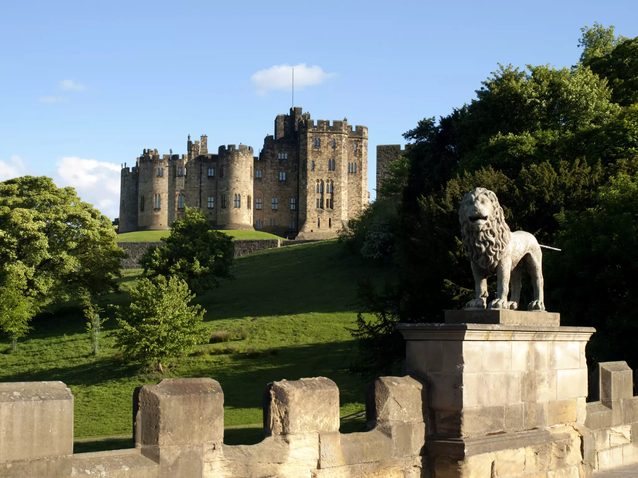 Used as a backdrop for many key scenes in Harry Potter movies, travelers can take flying lessons at Alnwick Castle. Gannet77 / Getty Images