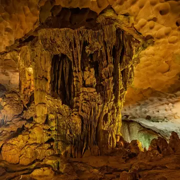 Illuminated interior of the Sung Sot Cave, Halong Bay.
