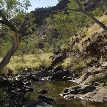 Rocky Water Hole at N'Dhala Gorge Nature Park near Ross River Homestead in the East Macdonnell Ranges, Northern Territory, Central Australia.