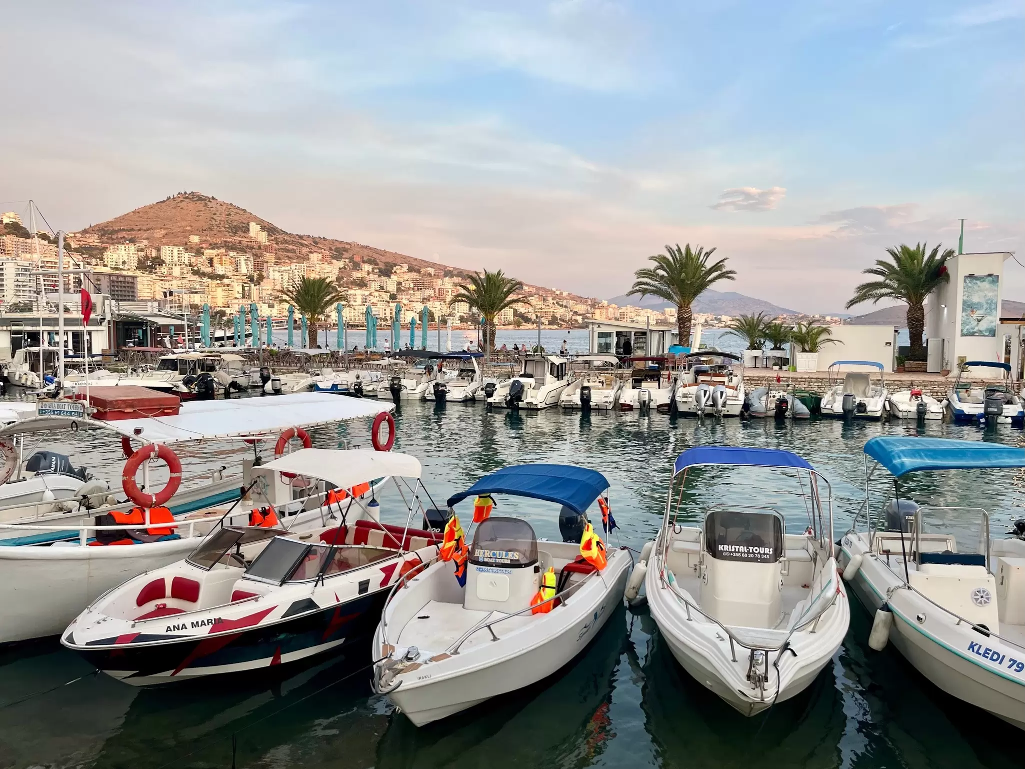 A small harbor packed with speed boats.