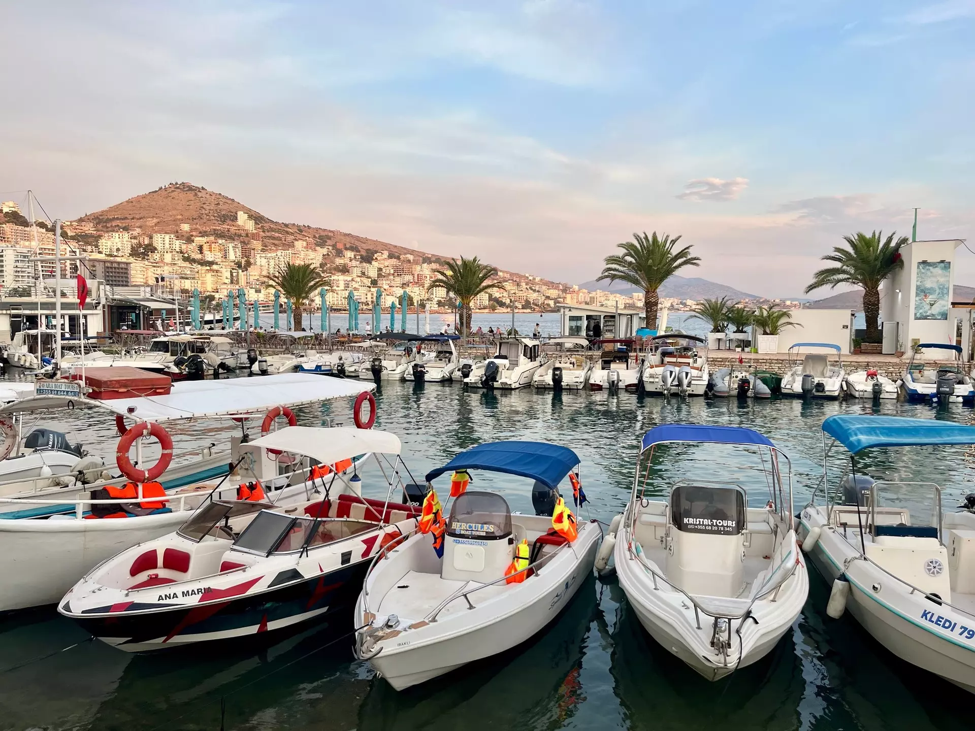 A small harbor packed with speed boats.