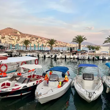 A small harbor packed with speed boats.