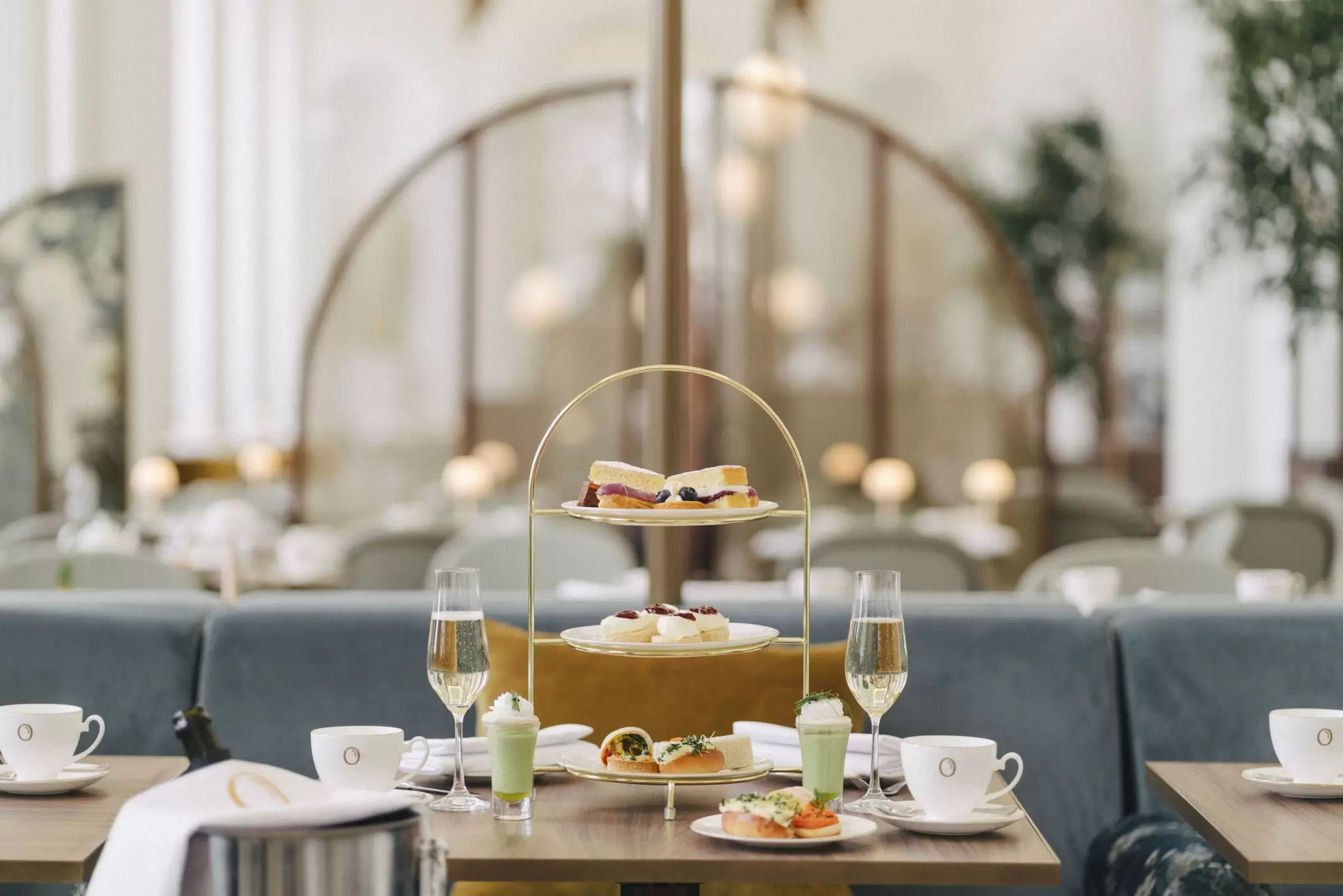 The food offer for afternoon tea at Kensington Palace including a cake stand with cakes and finger sandwiches
