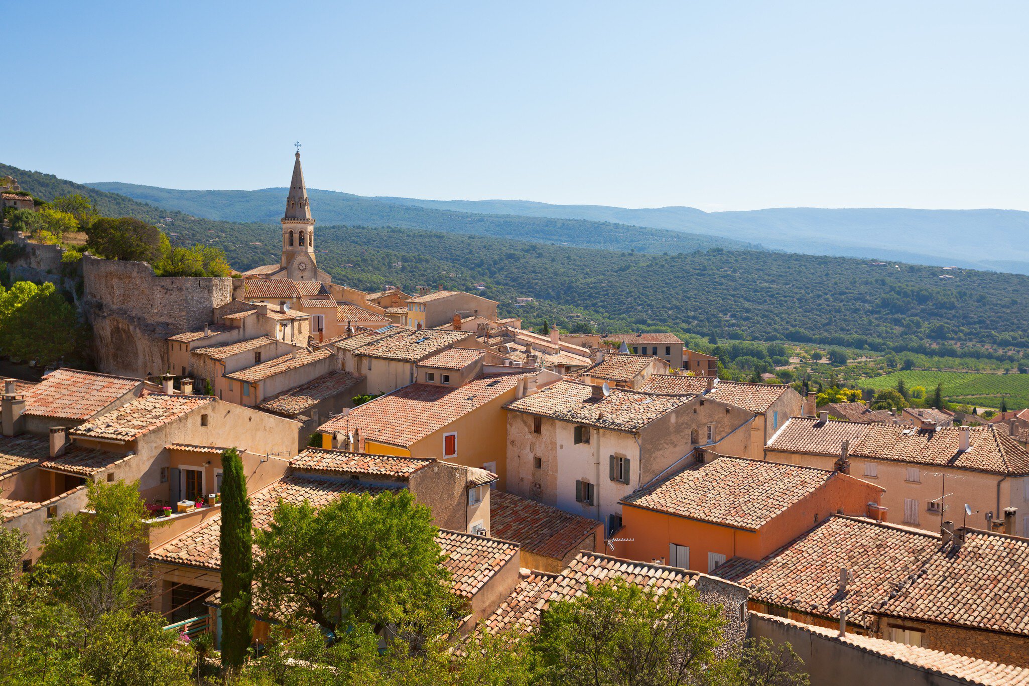 Rooftops and church steeple.