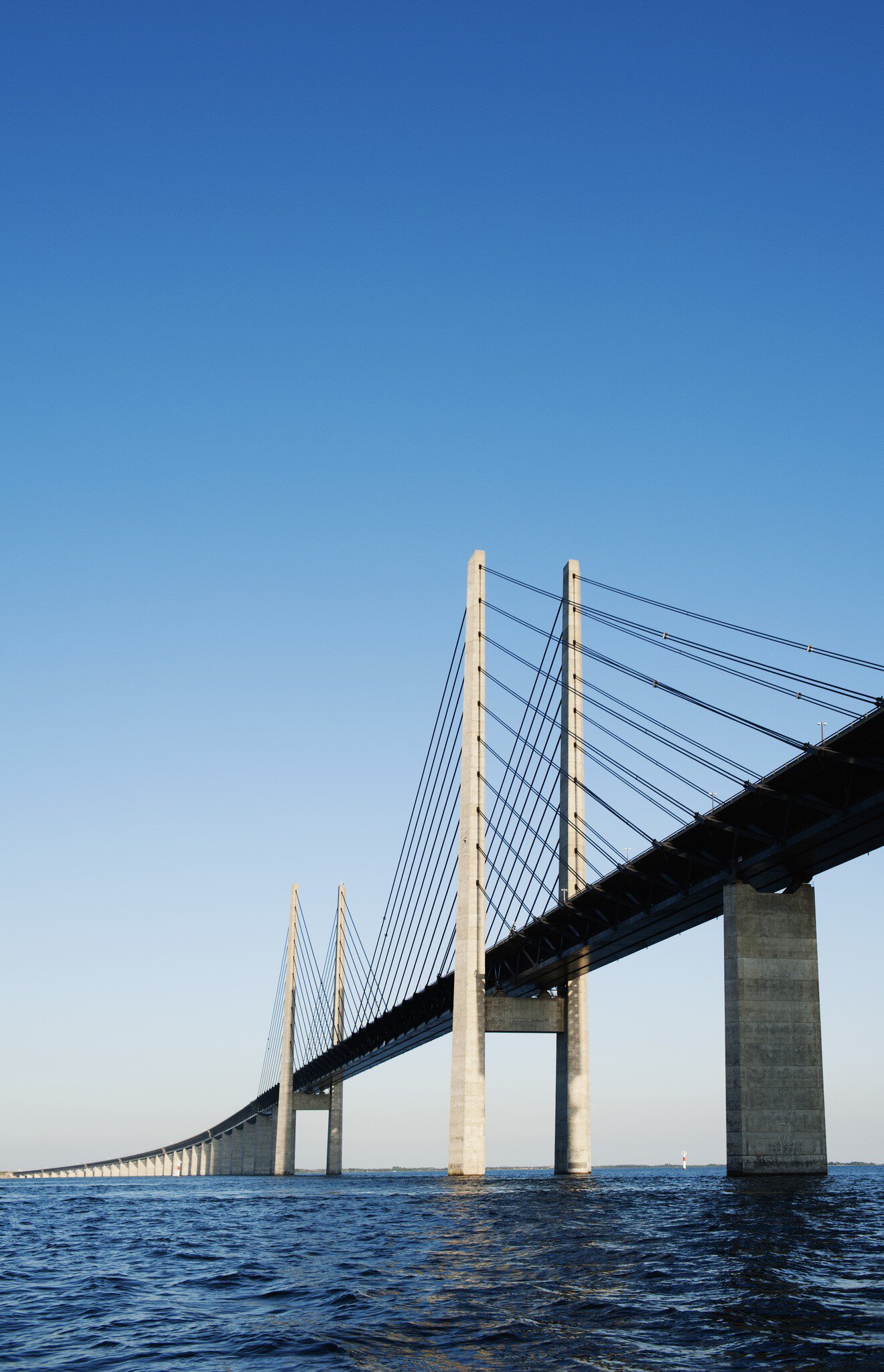 Built Structure Communication Connection Architecture Transportation Vertical Outdoors Low Angle View Bridge - Man Made Structure Blue Water Summer Day Sea Color Image Copy Space No People Photography Clear Sky The Sound Oeresund Bridge Sunny
View of Oresund Bridge