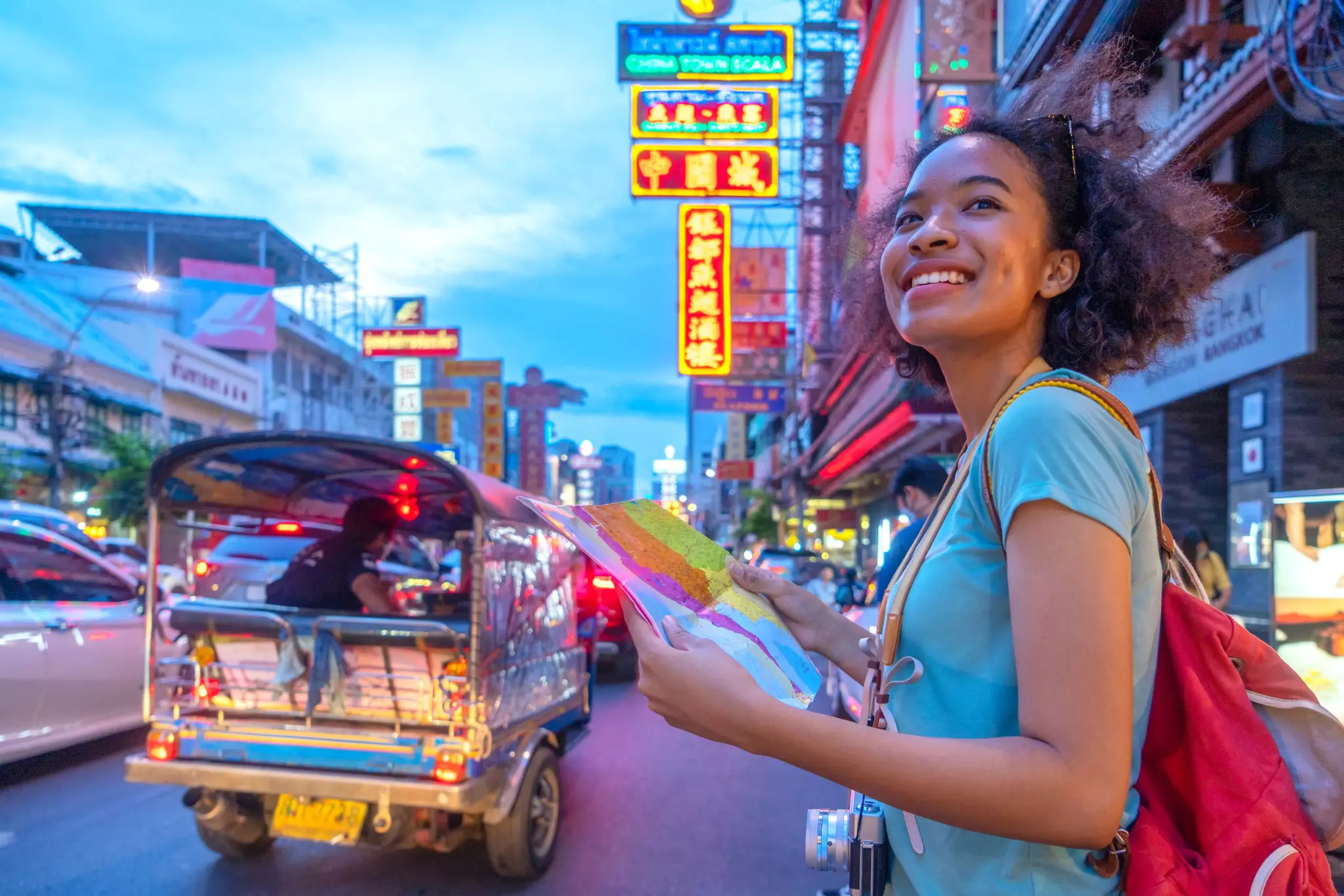 Stay in a neighborhood away from the tourist crowds to save money © boonchai wedmakawand / Getty Images