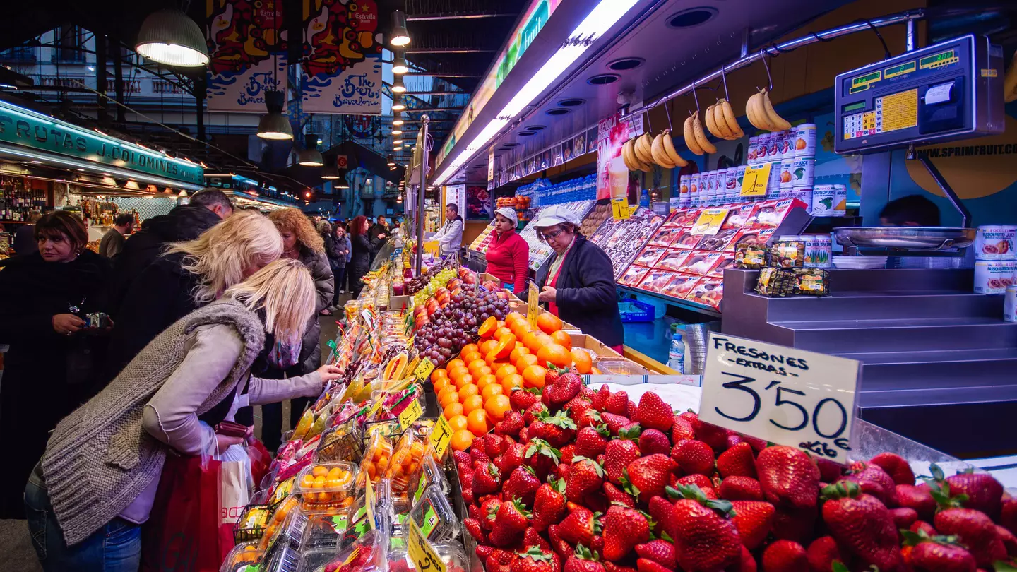 Locals shop in Mercat de Santa Caterina market in the La Rambla area of Barcelona, Spain.