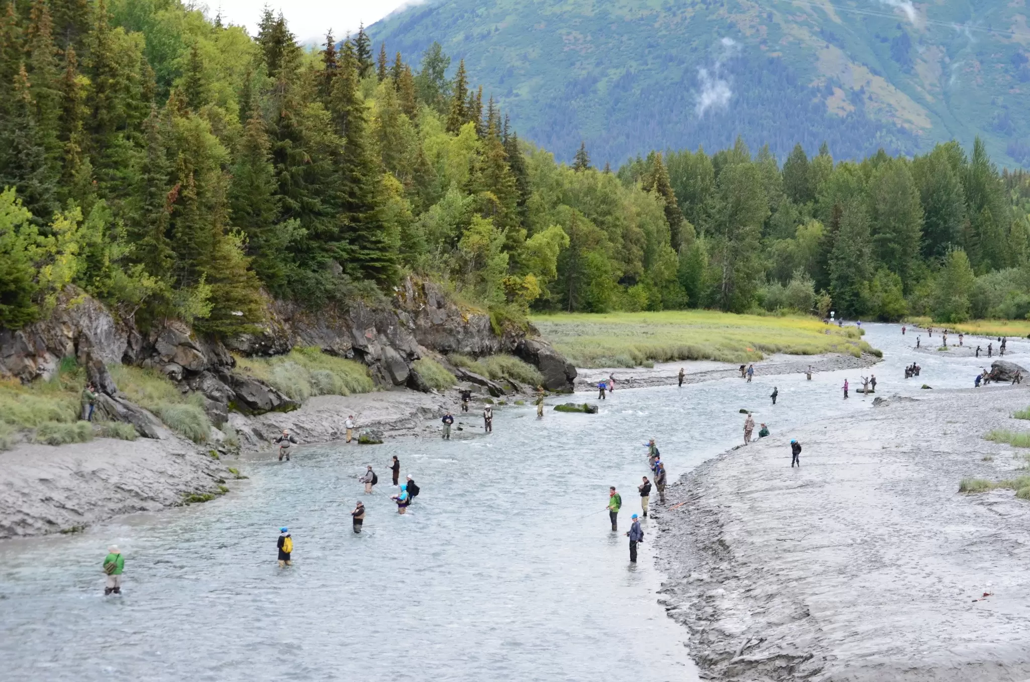 Bird Creek in the shadow of the Chugach Mountains is lined with fisherman hoping to catch silver salmon © Karen Timmons / Getty Images
