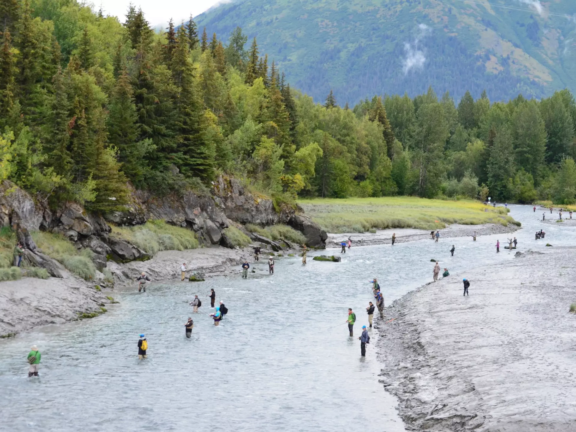 Bird Creek in the shadow of the Chugach Mountains is lined with fisherman hoping to catch silver salmon © Karen Timmons / Getty Images