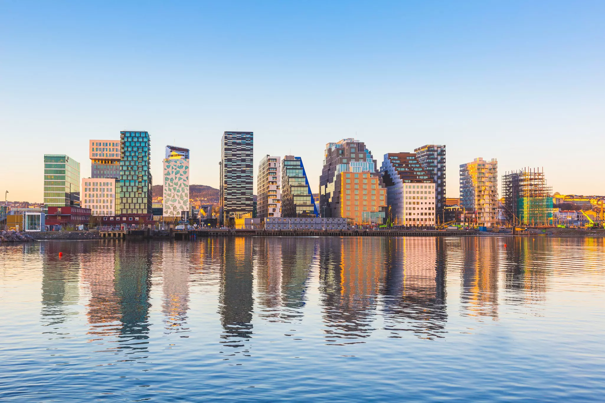 Modern buildings in Oslo, Norway, with their reflection into the water