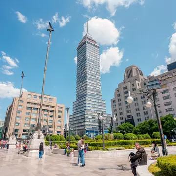 View of the Torre Latinoamericana on a sunny day in Mexico City.
